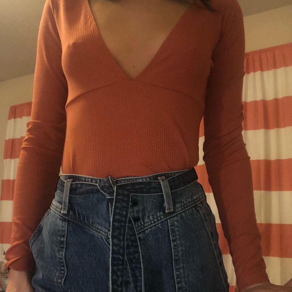 Deep v neck body suit